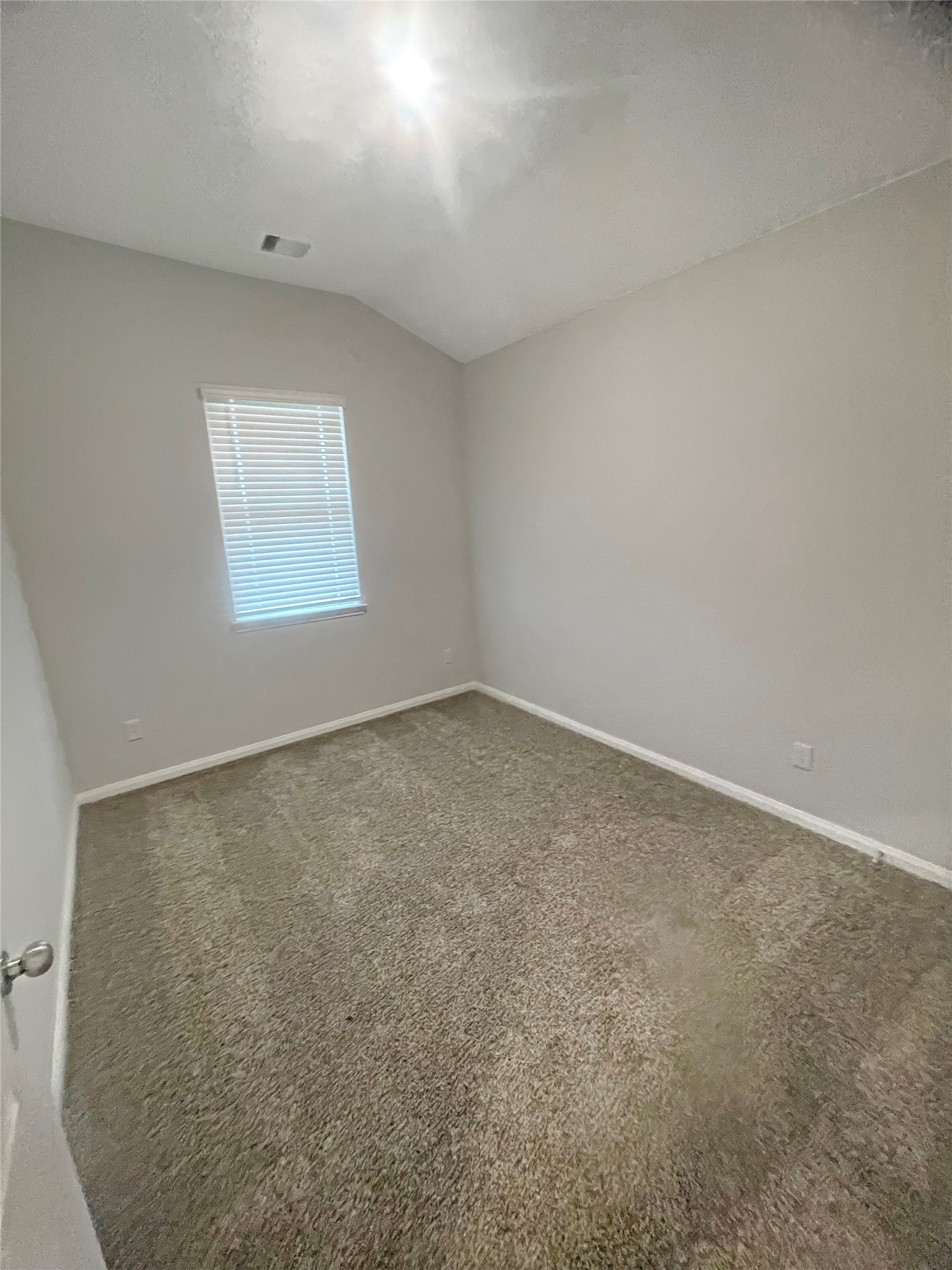 25421 Honus Wagner Way Splendora, TX 77372 - Photo 18 of 24 an empty room with a workbench