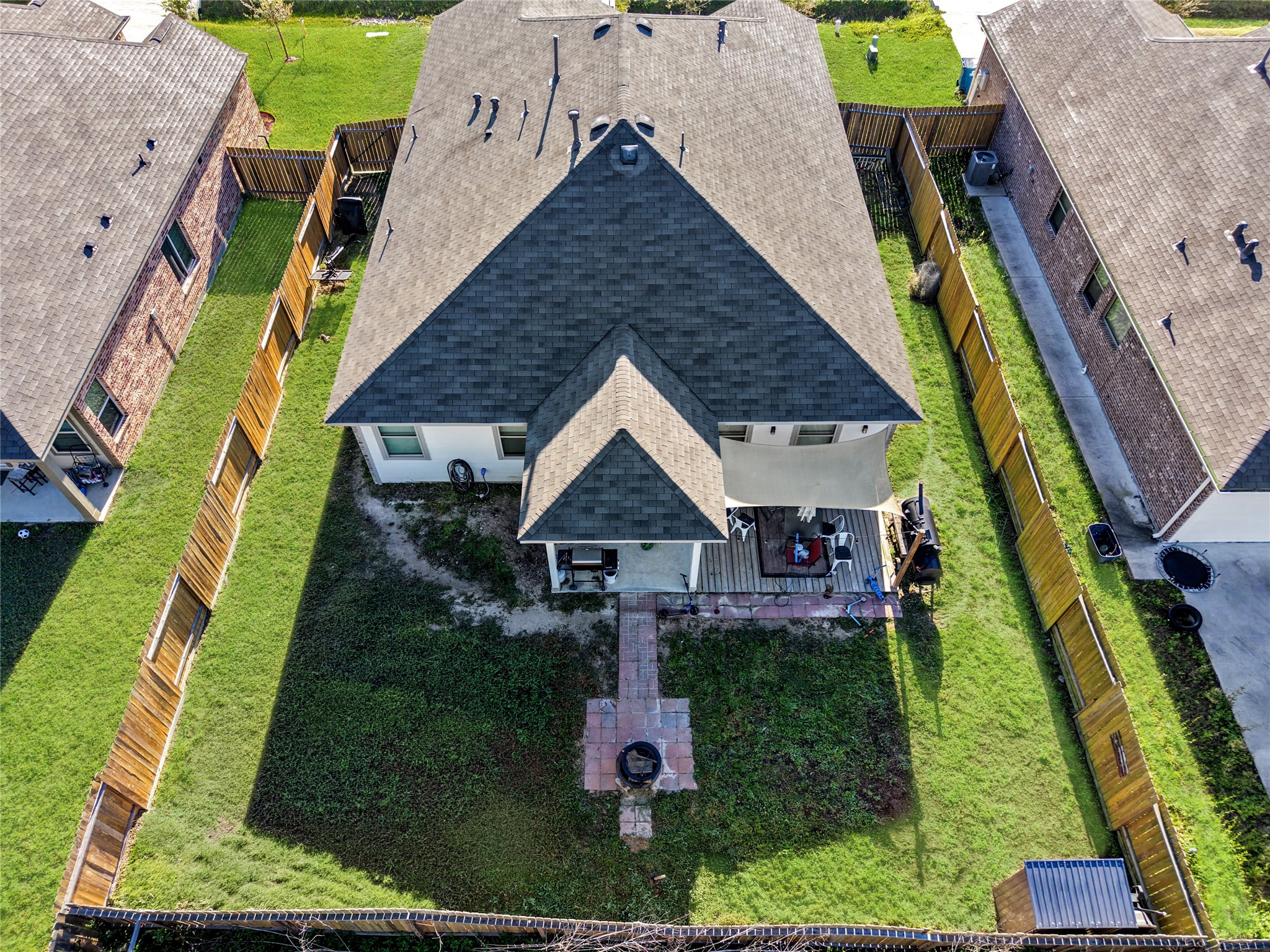 25421 Honus Wagner Way Splendora, TX 77372 - Photo 22 of 24 an aerial view of a house with a yard