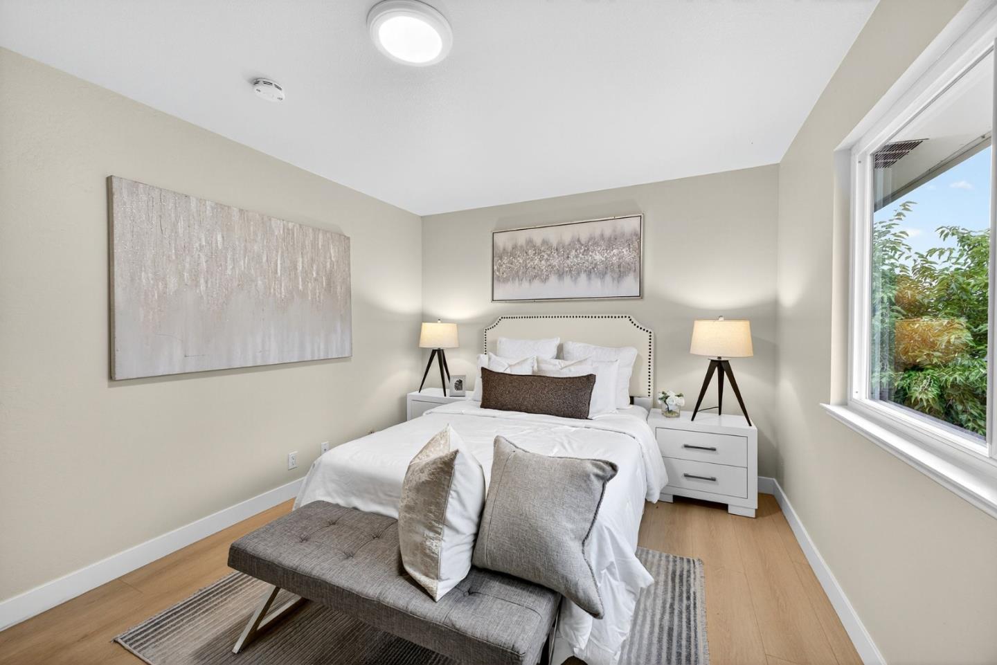 375 North 3rd Street, Unit 3 Campbell, CA 95008 - Photo 13 of 27 a bedroom with a bed and a large window