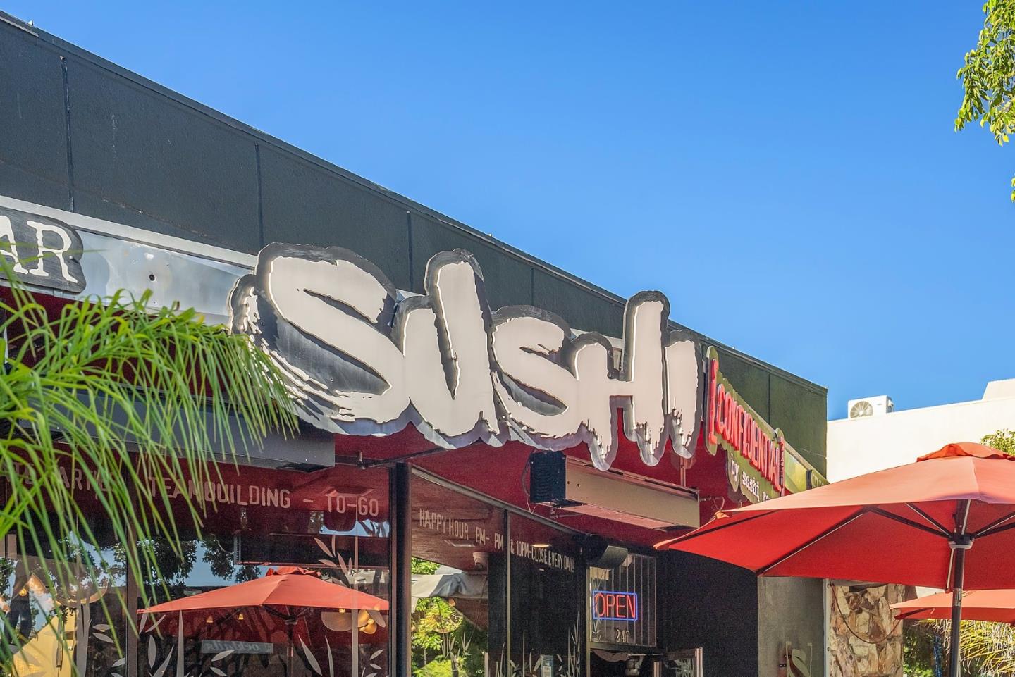 375 North 3rd Street, Unit 3 Campbell, CA 95008 - Photo 27 of 27 a view of a cafe with a table and chairs under an umbrella