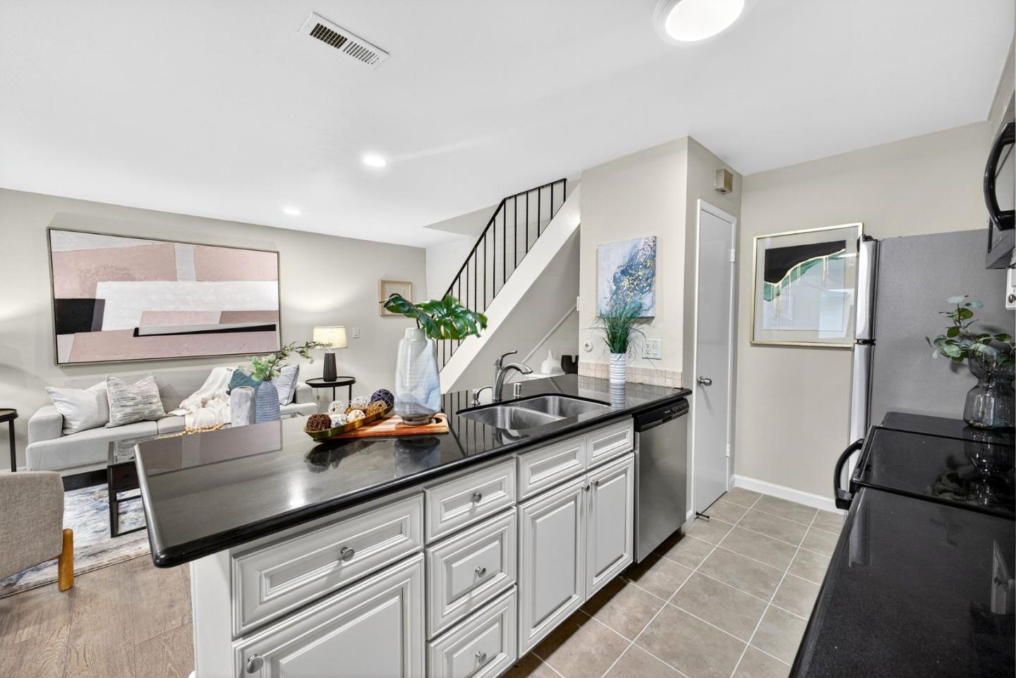 375 North 3rd Street, Unit 3 Campbell, CA 95008 - Photo 7 of 27 a kitchen with sink refrigerator and stove