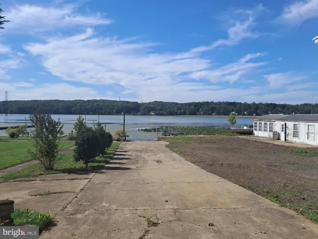 a view of a lake with a big yard