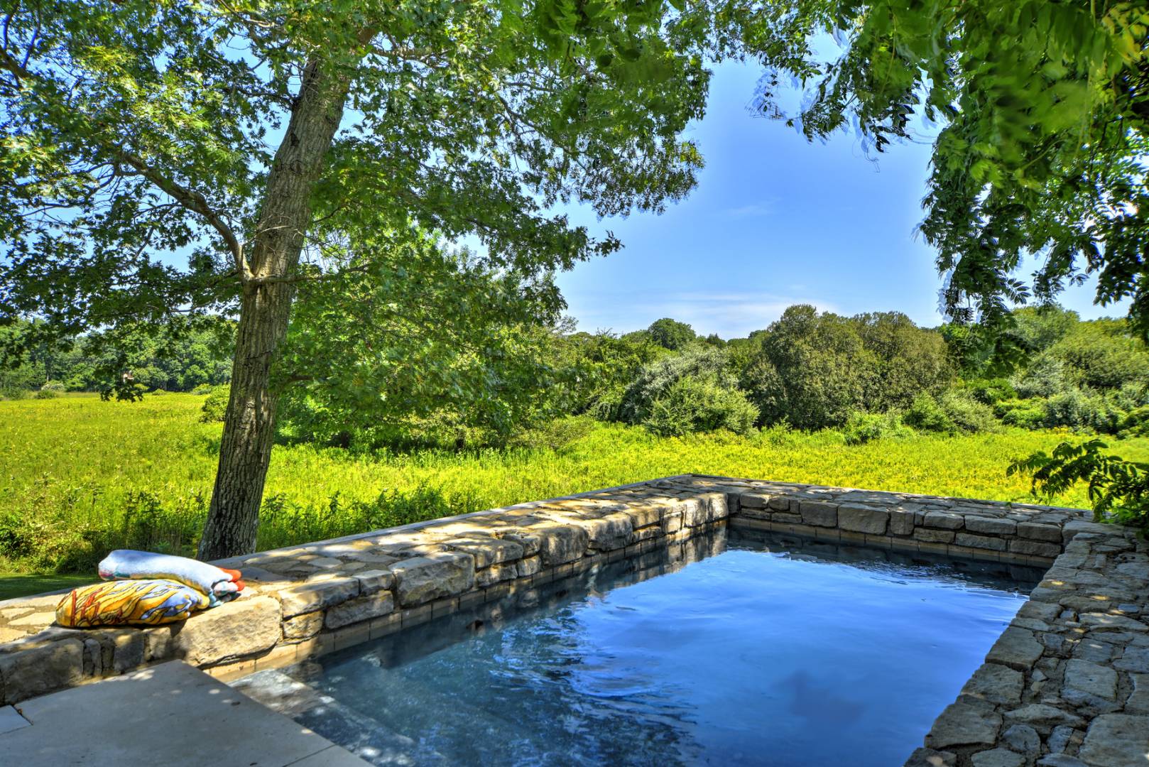 36 Briar Patch Road East Hampton, NY 11937 - Photo 16 of 17 a view of a yard with an outdoor space
