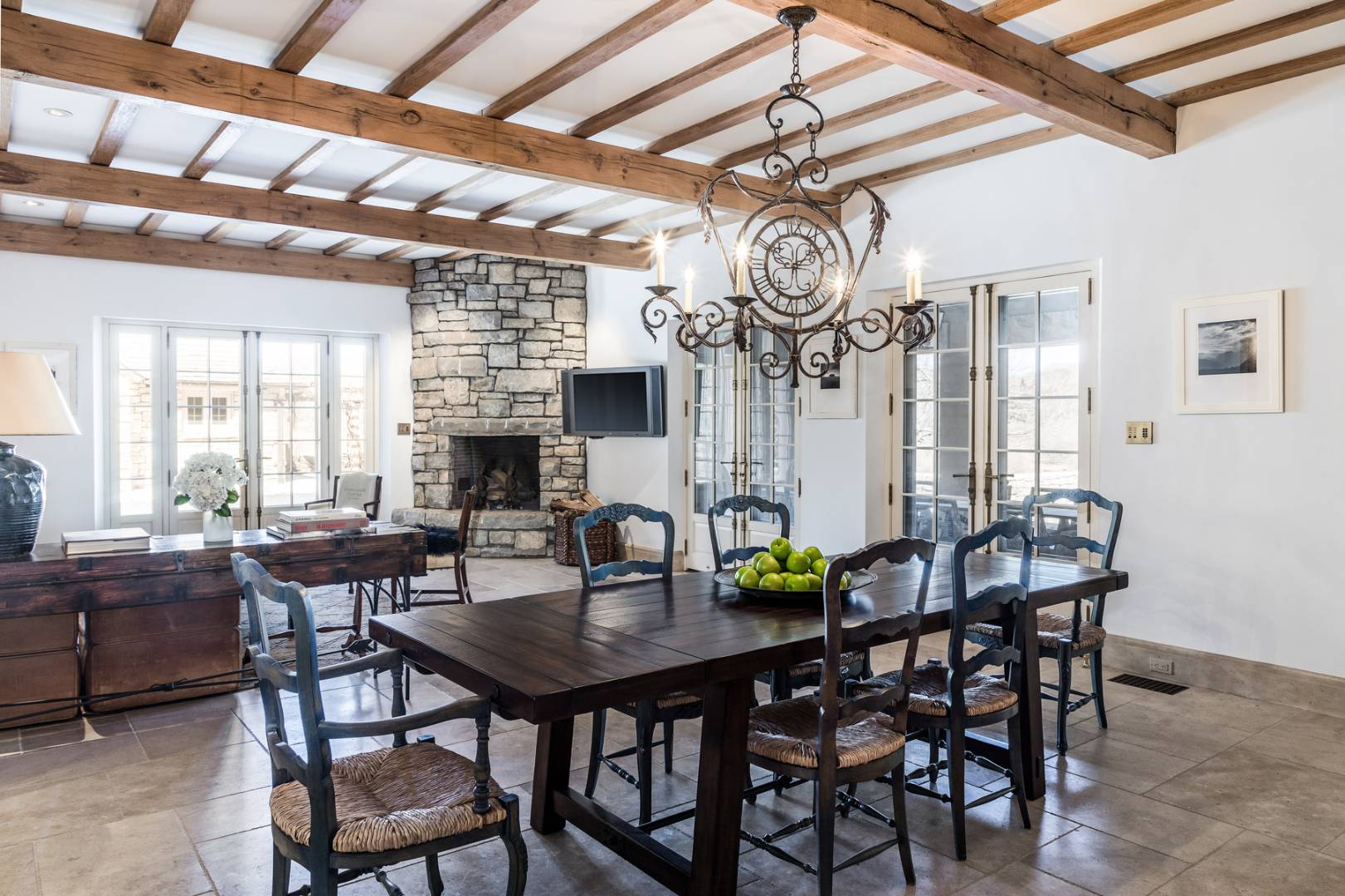 36 Briar Patch Road East Hampton, NY 11937 - Photo 6 of 17 a view of a dining room with furniture wooden floor and chandelier