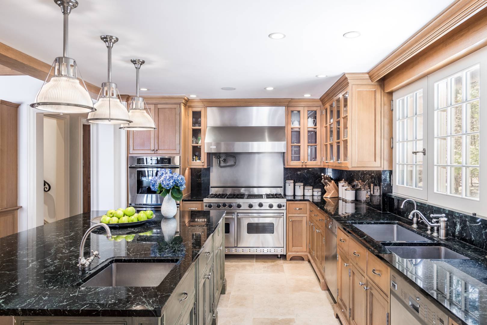 36 Briar Patch Road East Hampton, NY 11937 - Photo 7 of 17 a kitchen that has a lot of cabinets stainless steel appliances and a counter