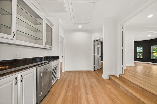 a view of balcony with wooden floor