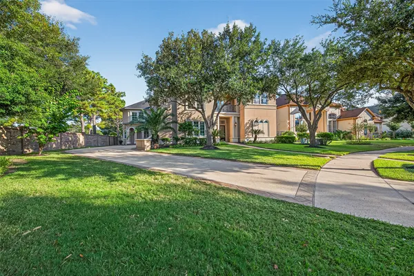 a house with trees in the background