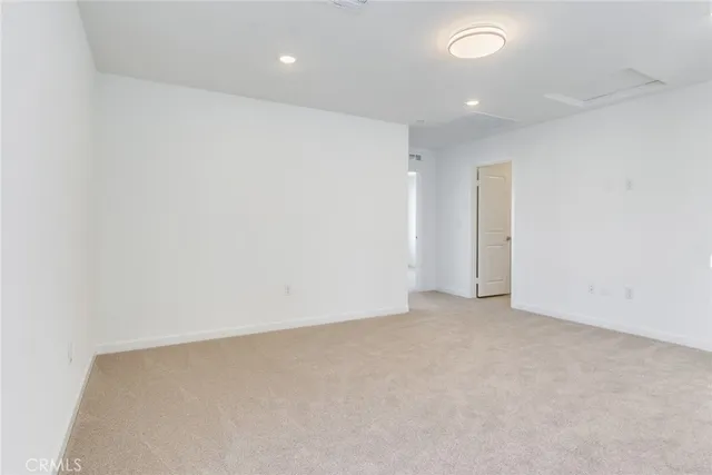 an empty room with an entryway