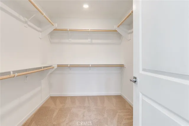 a view of an empty walk in closet