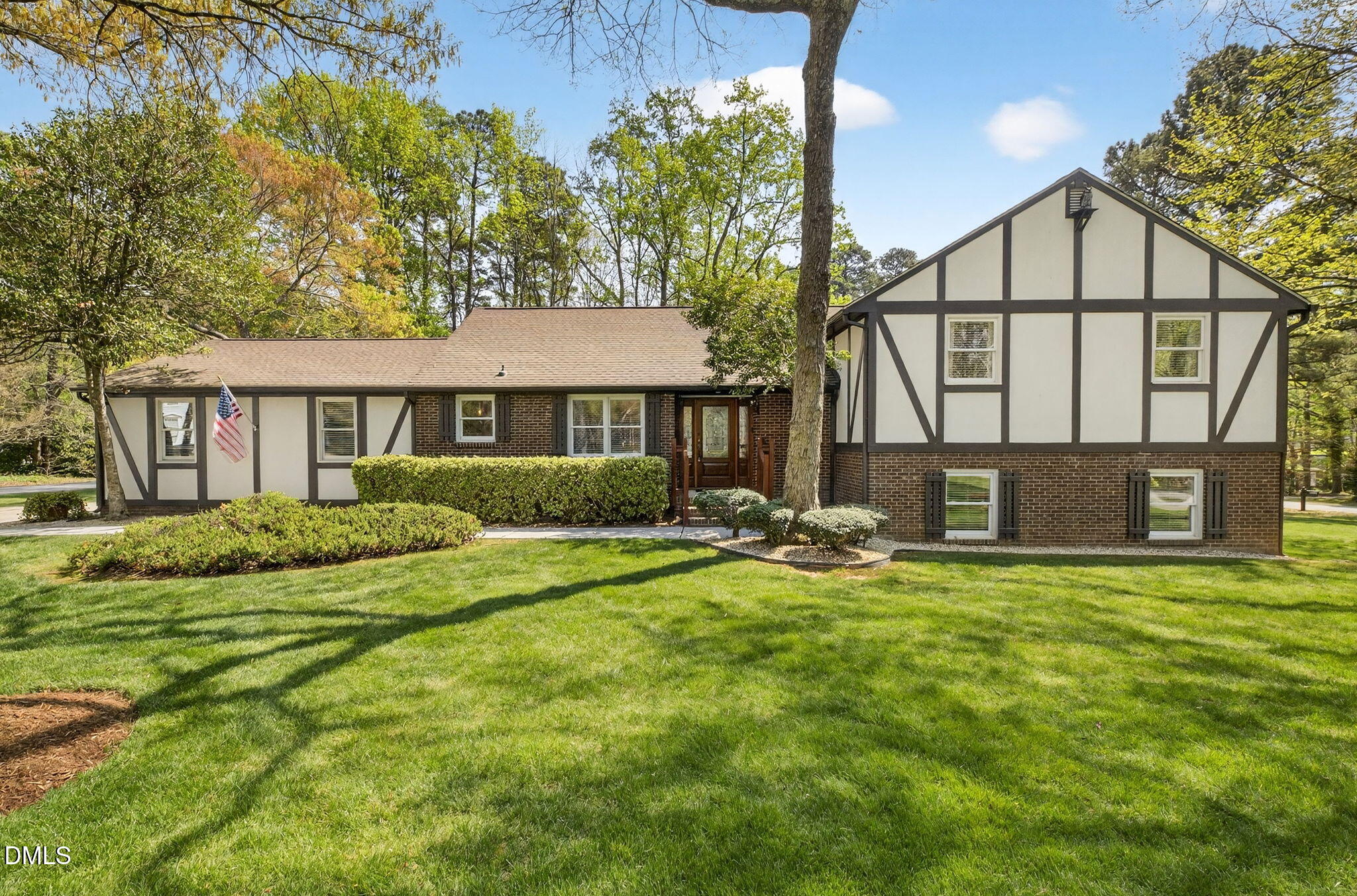 9400 Does Run Court Raleigh, NC 27613 - Photo 1 of 35 a view of a house with backyard and sitting area