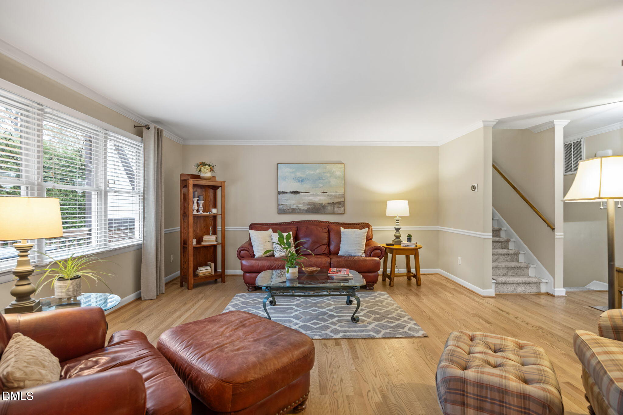9400 Does Run Court Raleigh, NC 27613 - Photo 12 of 35 a living room with furniture and a wooden floor