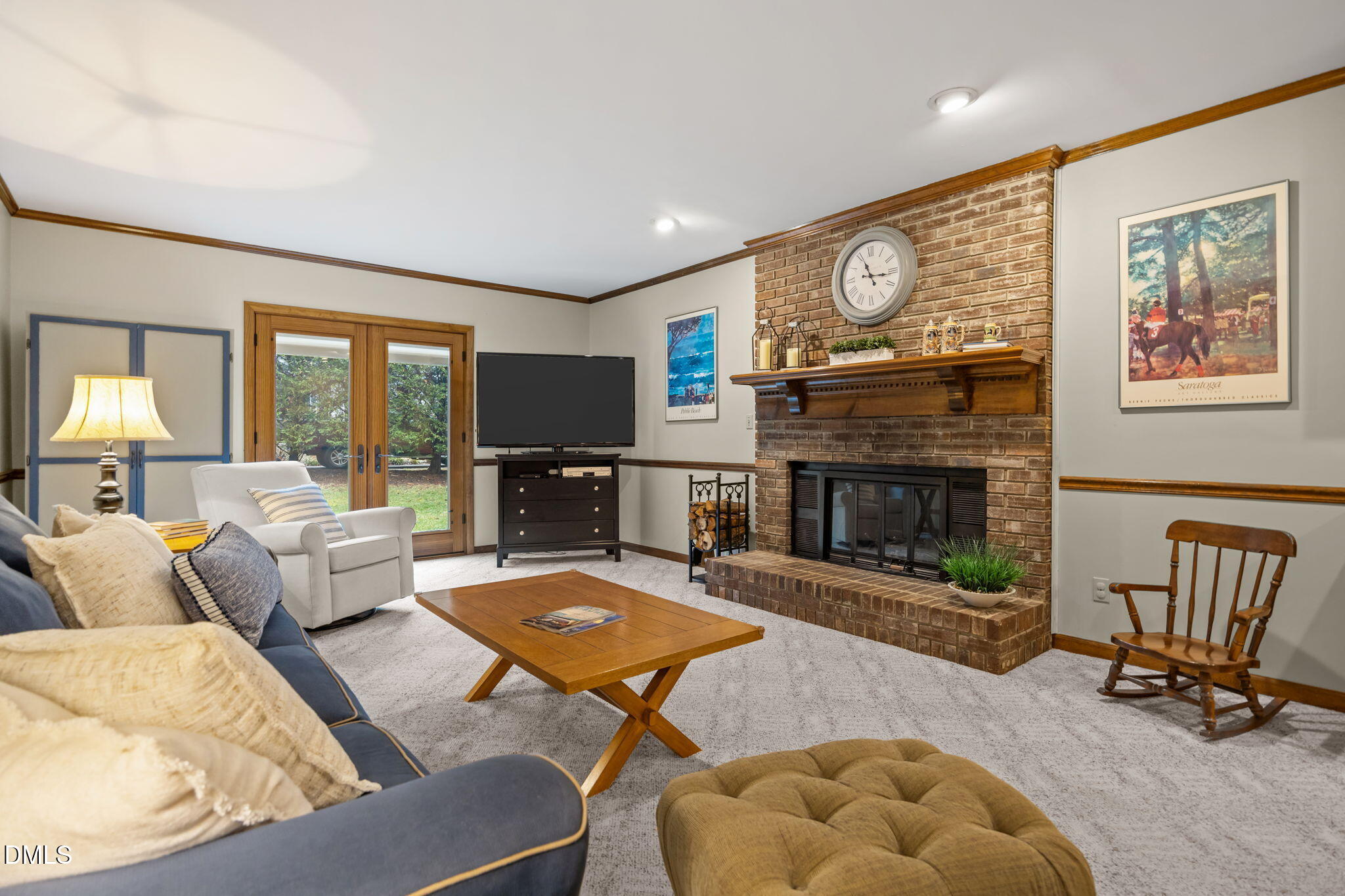 9400 Does Run Court Raleigh, NC 27613 - Photo 24 of 35 a living room with furniture and a fireplace