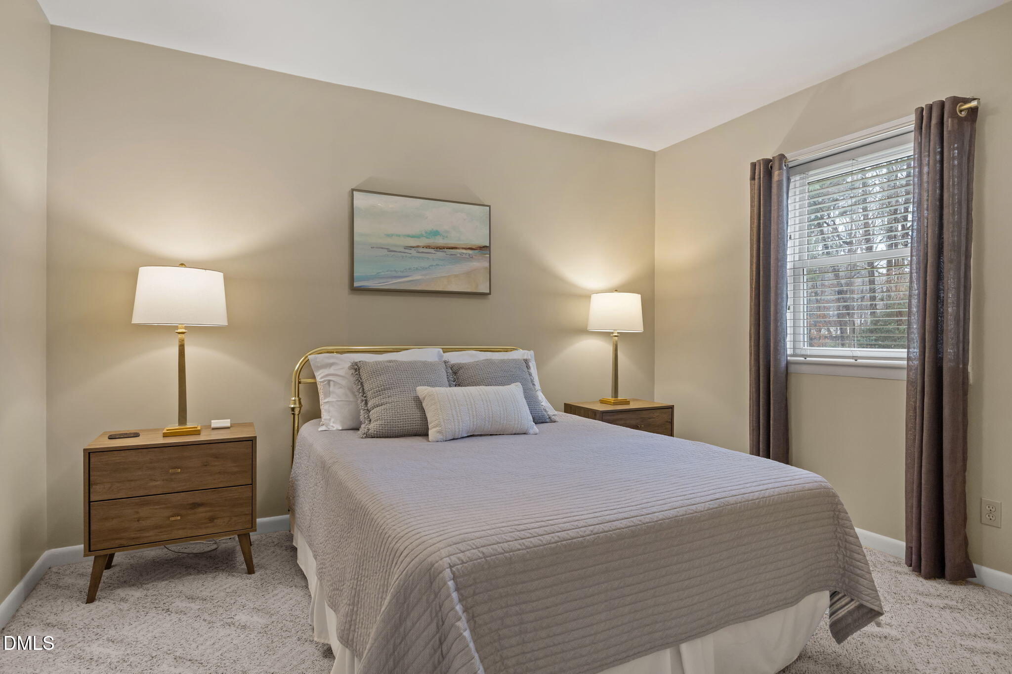 9400 Does Run Court Raleigh, NC 27613 - Photo 28 of 35 a bedroom with a bed and a lamp