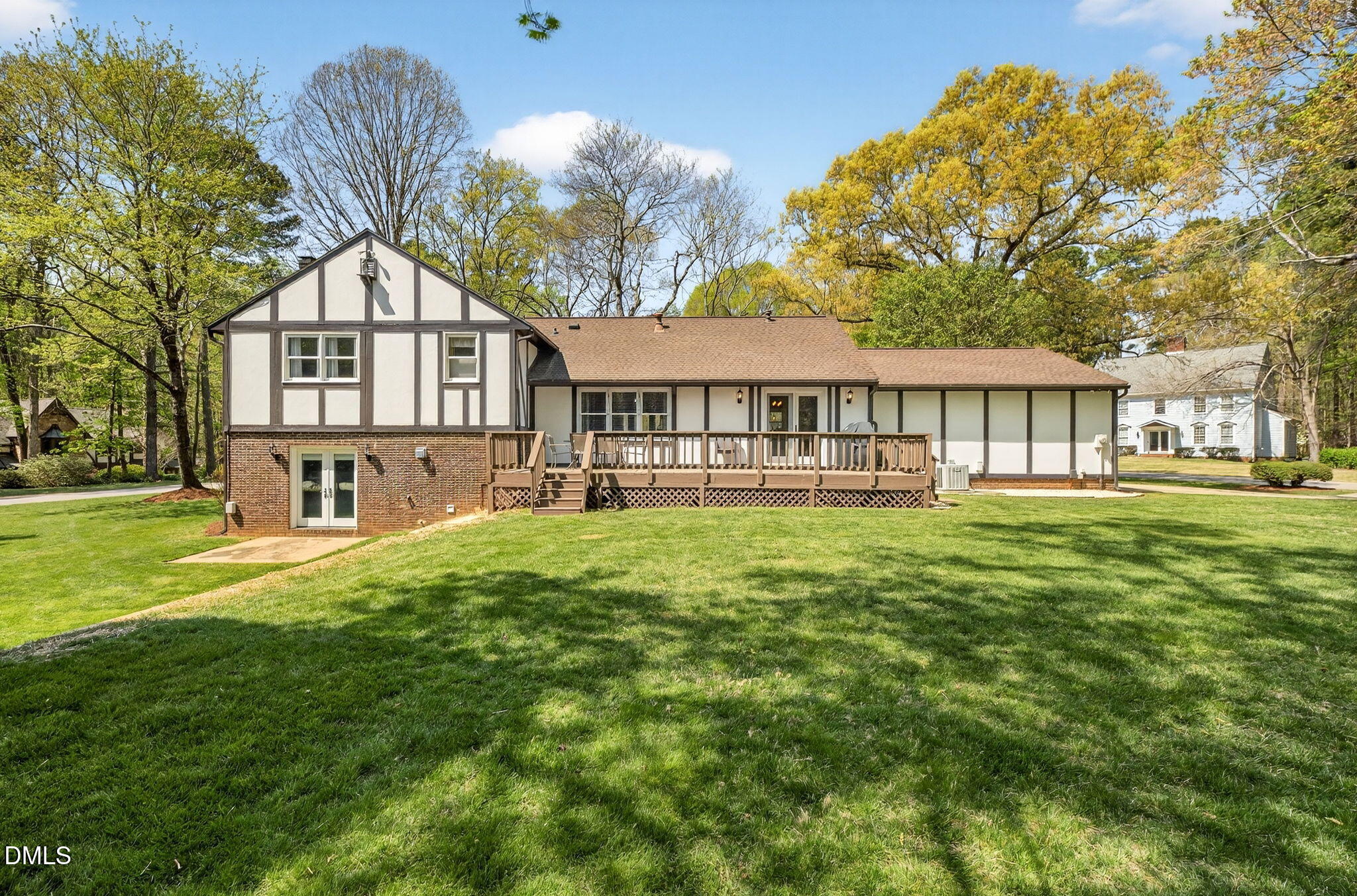 9400 Does Run Court Raleigh, NC 27613 - Photo 31 of 35 a front view of a house with a yard table and chairs