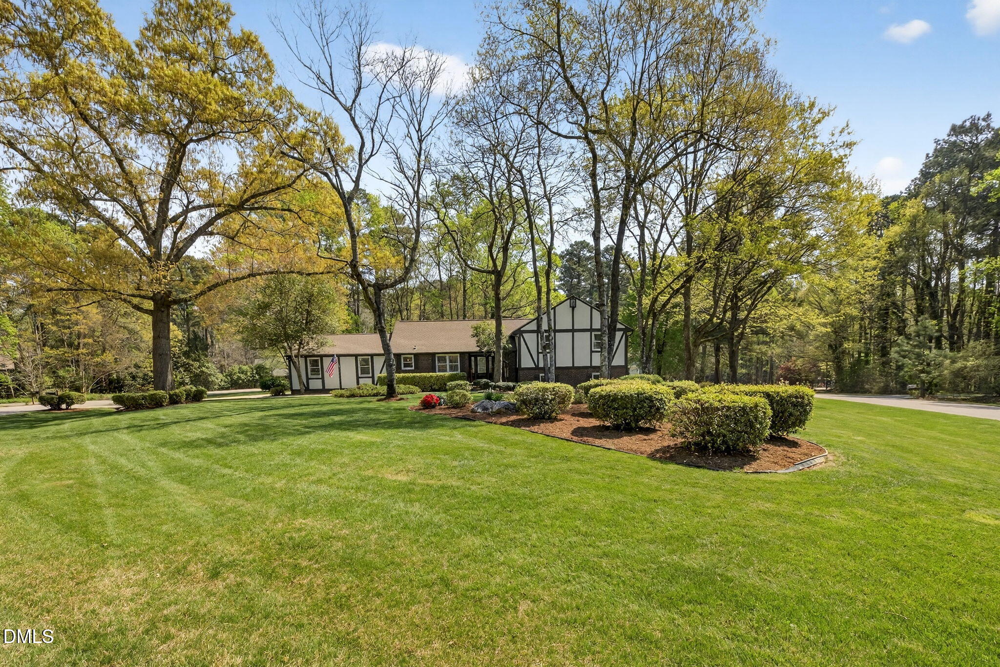 9400 Does Run Court Raleigh, NC 27613 - Photo 33 of 35 a backyard of a house with table and chairs