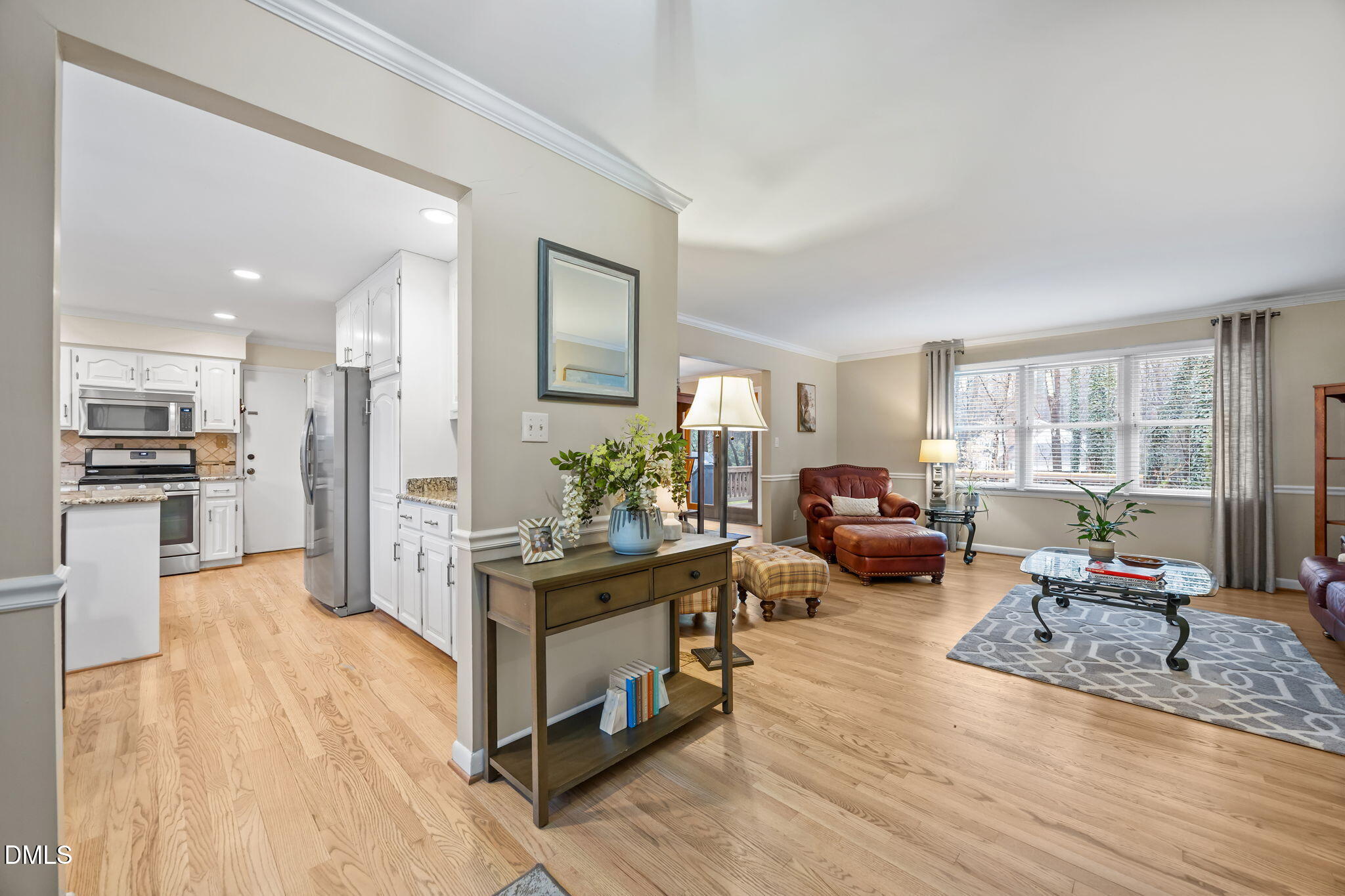 9400 Does Run Court Raleigh, NC 27613 - Photo 4 of 35 a living room with furniture and a wooden floor