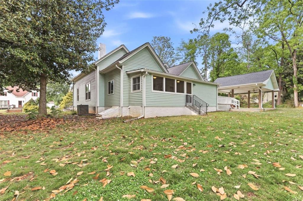 420 Fore Acre Street Cornelia, GA 30531 - Photo 18 of 48 a front view of a house with garden