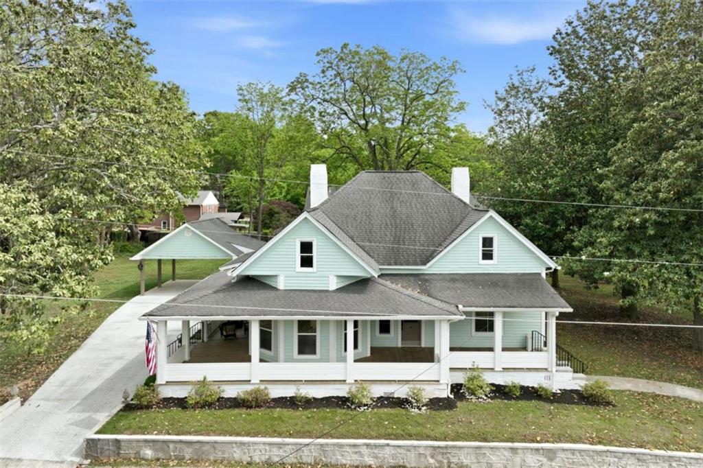 420 Fore Acre Street Cornelia, GA 30531 - Photo 2 of 48 a front view of a house with a yard