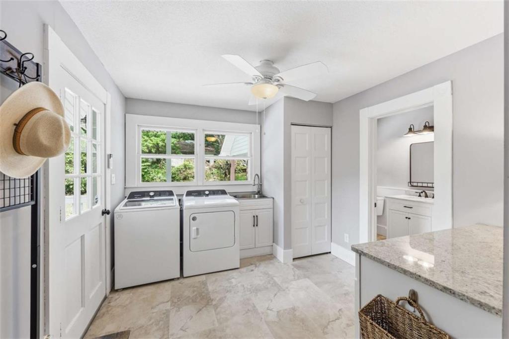 420 Fore Acre Street Cornelia, GA 30531 - Photo 36 of 48 a kitchen with white cabinets and window