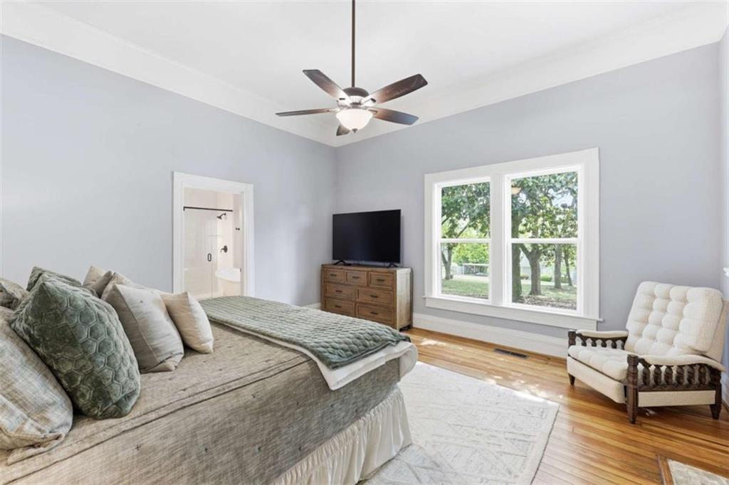 420 Fore Acre Street Cornelia, GA 30531 - Photo 40 of 48 a spacious bedroom with a bed and a couch