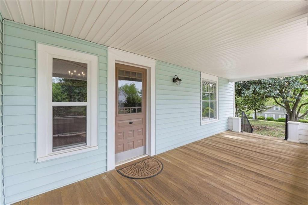 420 Fore Acre Street Cornelia, GA 30531 - Photo 4 of 48 a bedroom with a bed and a large window