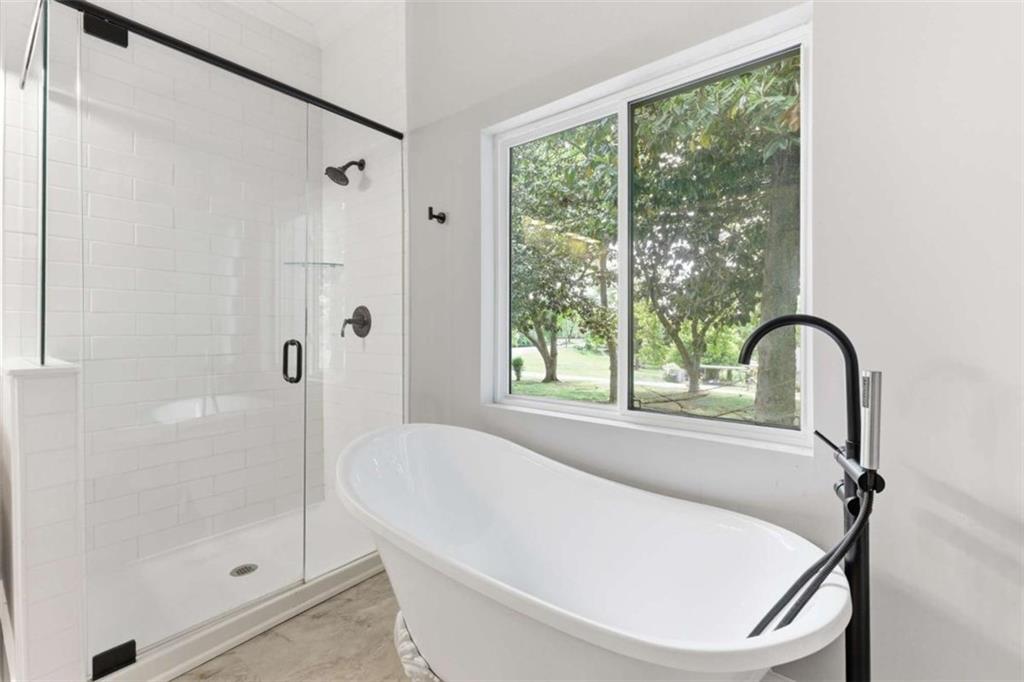 420 Fore Acre Street Cornelia, GA 30531 - Photo 44 of 48 a white bath tub sitting next to a shower