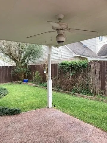a view of a backyard with a garden and plants