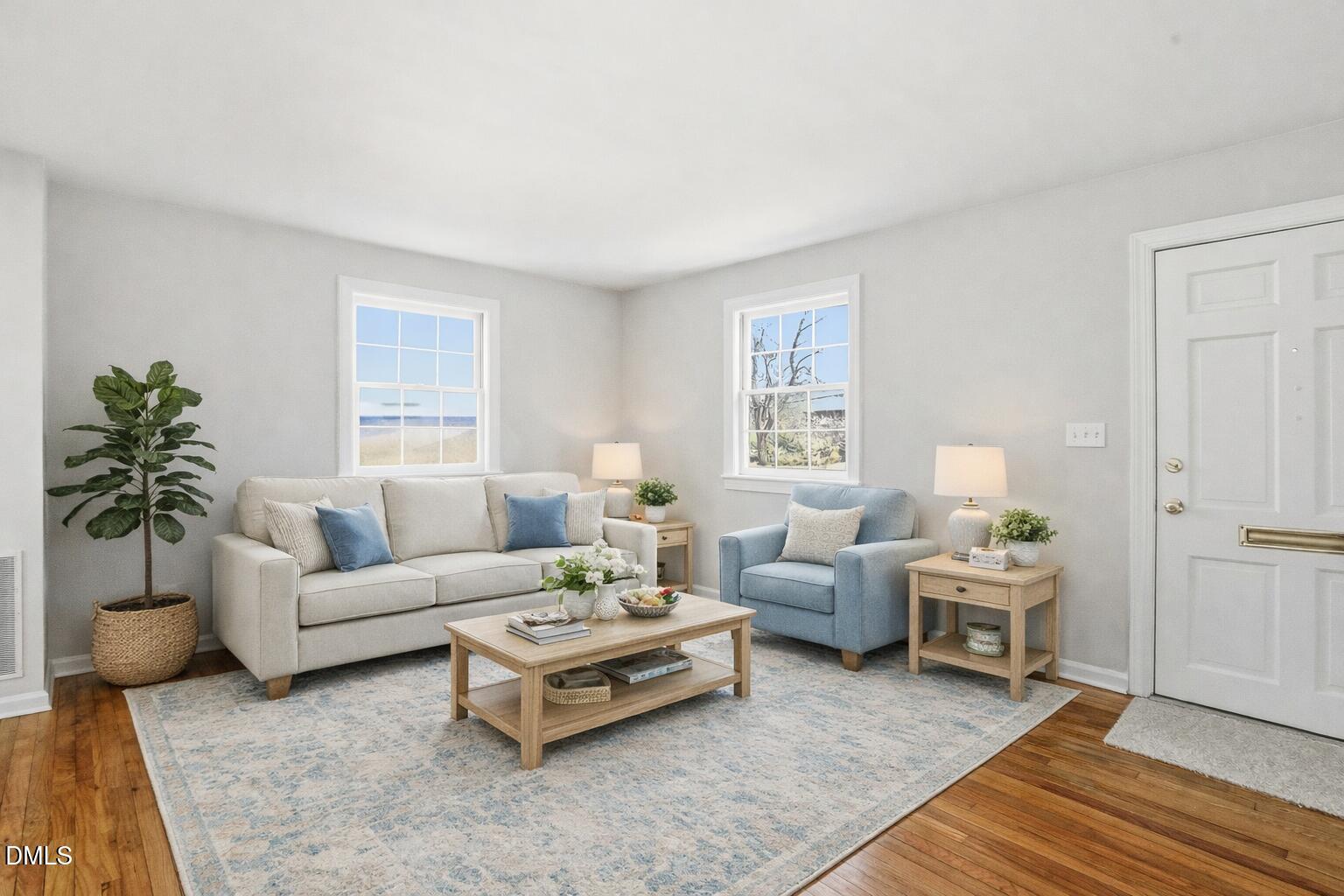 933 St Marys Street Raleigh, NC 27605 - Photo 7 of 34 Bright and peaceful living room setup