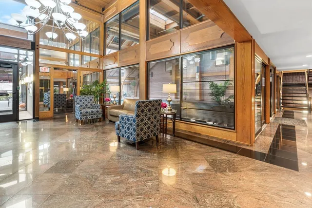 a view of swimming pool with a sitting space