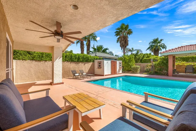 a view of a backyard with a patio