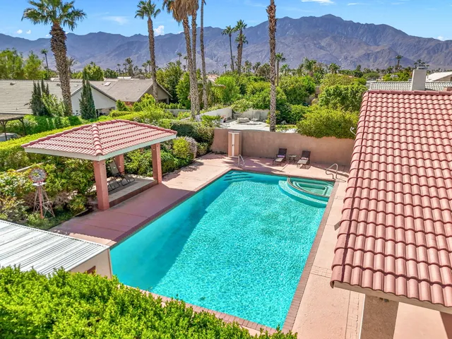 a view of yard with outdoor seating