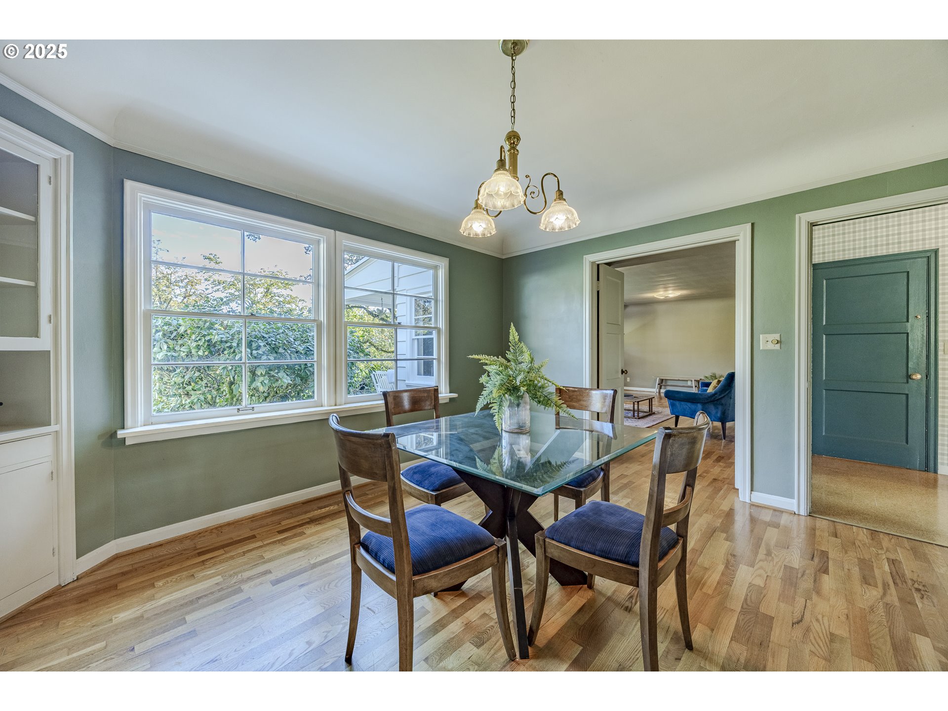 641 City View Boulevard Springfield, OR 97477 - Photo 11 of 48 a view of a dining room with furniture and wooden floor