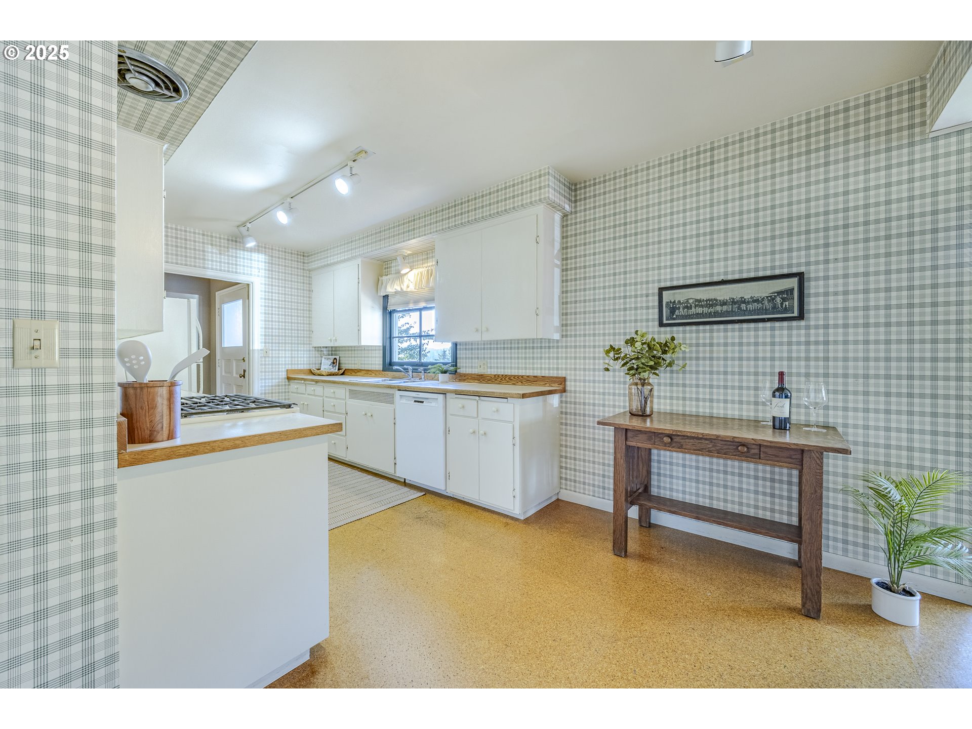 641 City View Boulevard Springfield, OR 97477 - Photo 13 of 48 a kitchen with stainless steel appliances kitchen island granite countertop a sink and cabinets