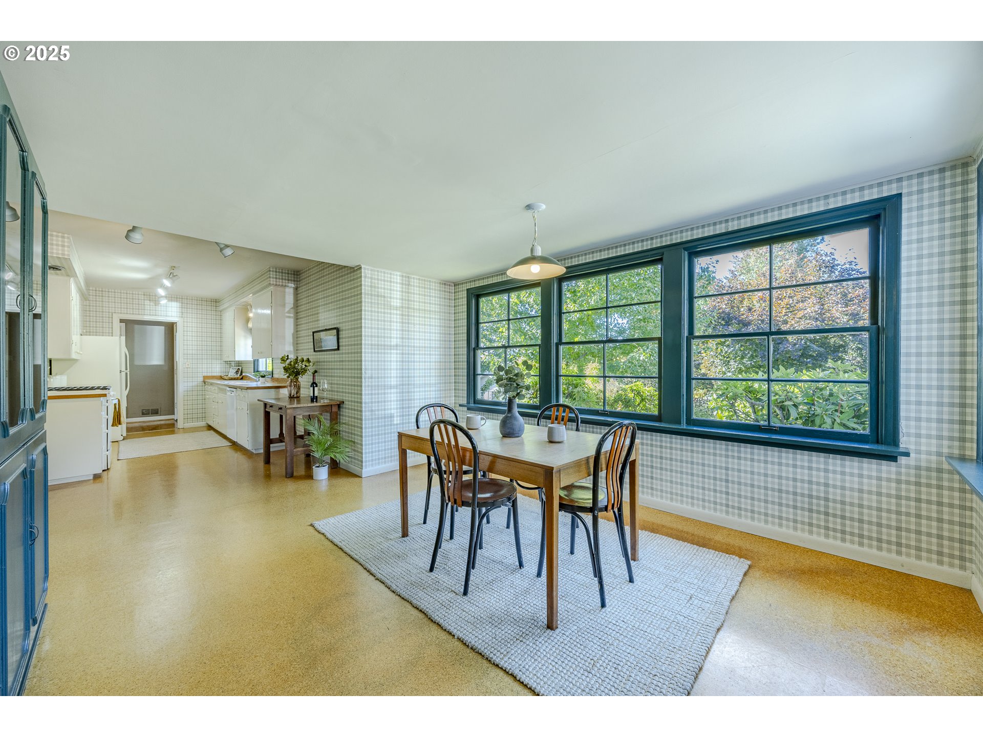 641 City View Boulevard Springfield, OR 97477 - Photo 16 of 48 a dining room with furniture and a floor to ceiling window