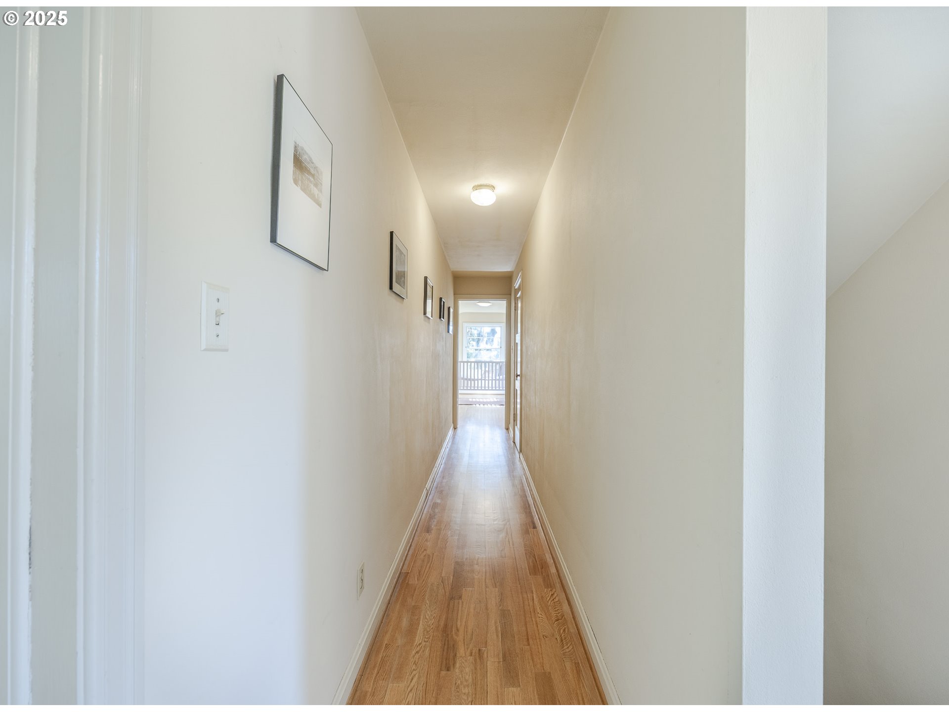 641 City View Boulevard Springfield, OR 97477 - Photo 27 of 48 a view of a hallway with wooden floor