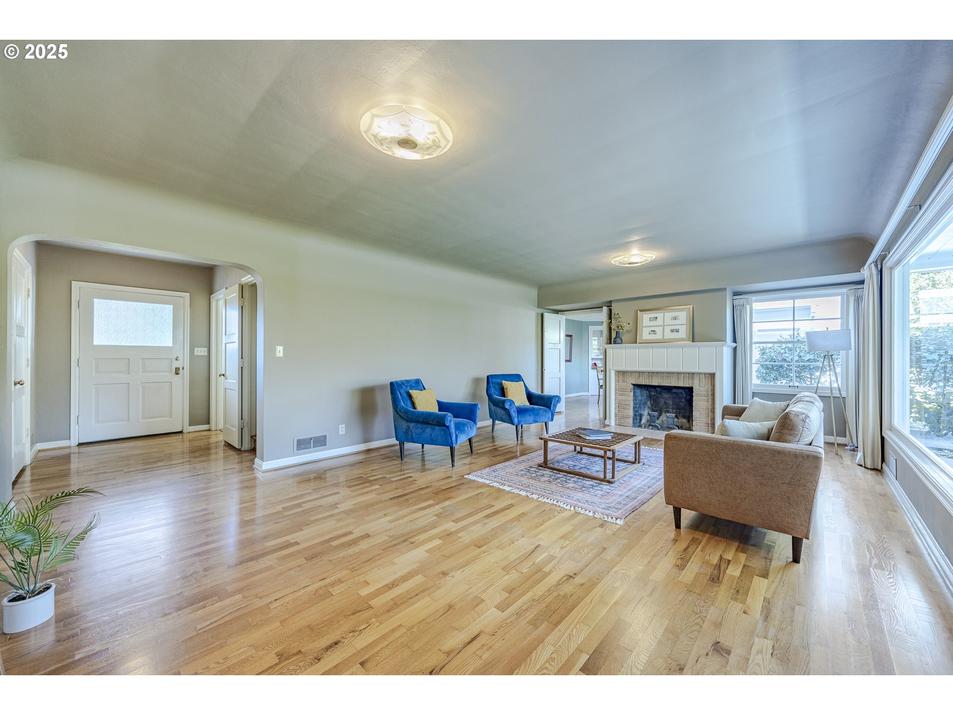 641 City View Boulevard Springfield, OR 97477 - Photo 7 of 48 a living room with furniture and a fireplace