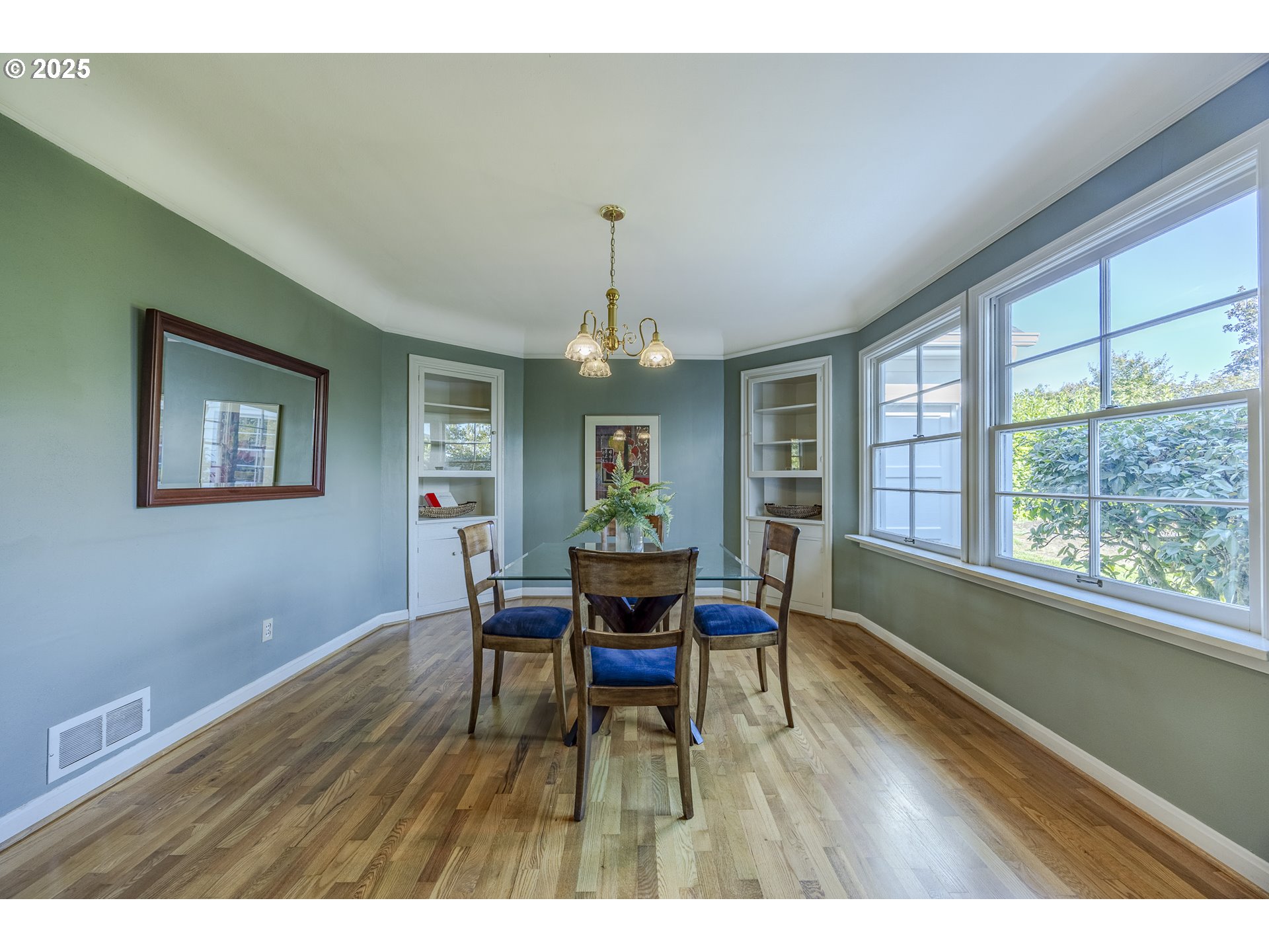 641 City View Boulevard Springfield, OR 97477 - Photo 10 of 48 a view of a dining room with furniture window and wooden floor