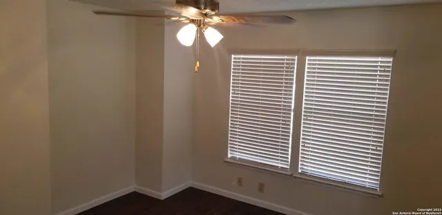 a view of a room that has a window in it