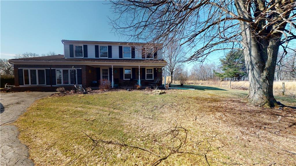 100 Eau Claire Road Boyers, PA 16020 - Photo 2 of 25 front view of a house with a yard