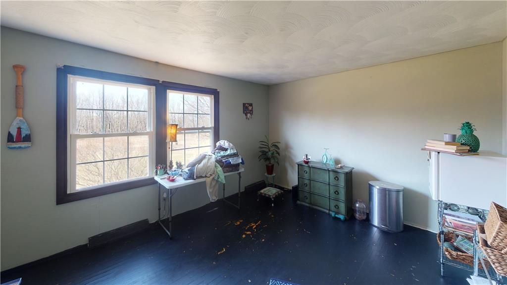 100 Eau Claire Road Boyers, PA 16020 - Photo 21 of 25 a living room with furniture and a window