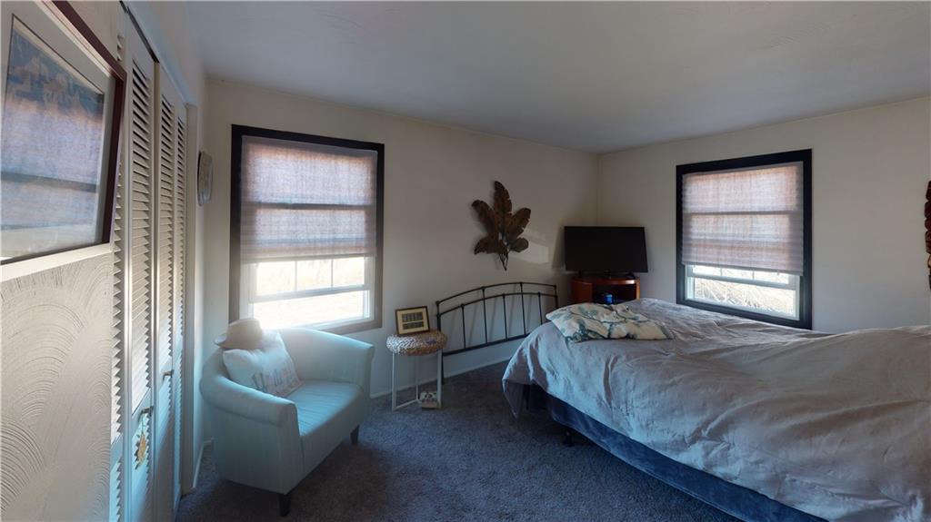 100 Eau Claire Road Boyers, PA 16020 - Photo 22 of 25 a bedroom with a bed and a window