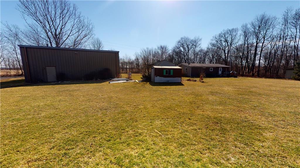 100 Eau Claire Road Boyers, PA 16020 - Photo 25 of 25 a backyard of a house with yard and wooden fence