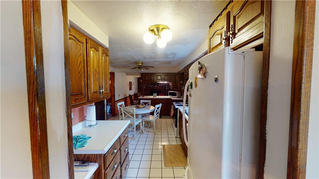 100 Eau Claire Road Boyers, PA 16020 - Photo 8 of 25 a view of a dining room with furniture window and entryway