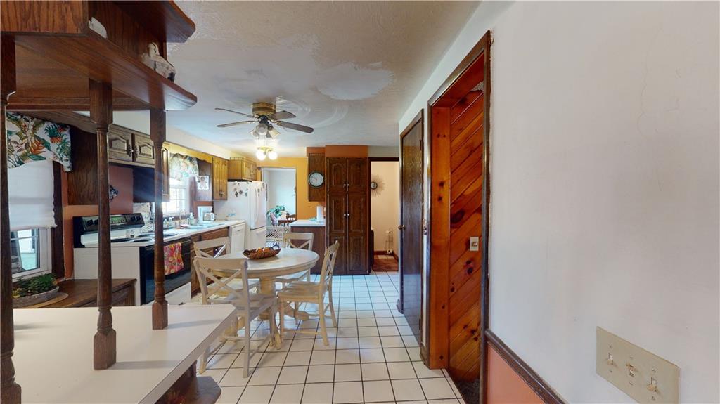100 Eau Claire Road Boyers, PA 16020 - Photo 9 of 25 a view of a living room and kitchen