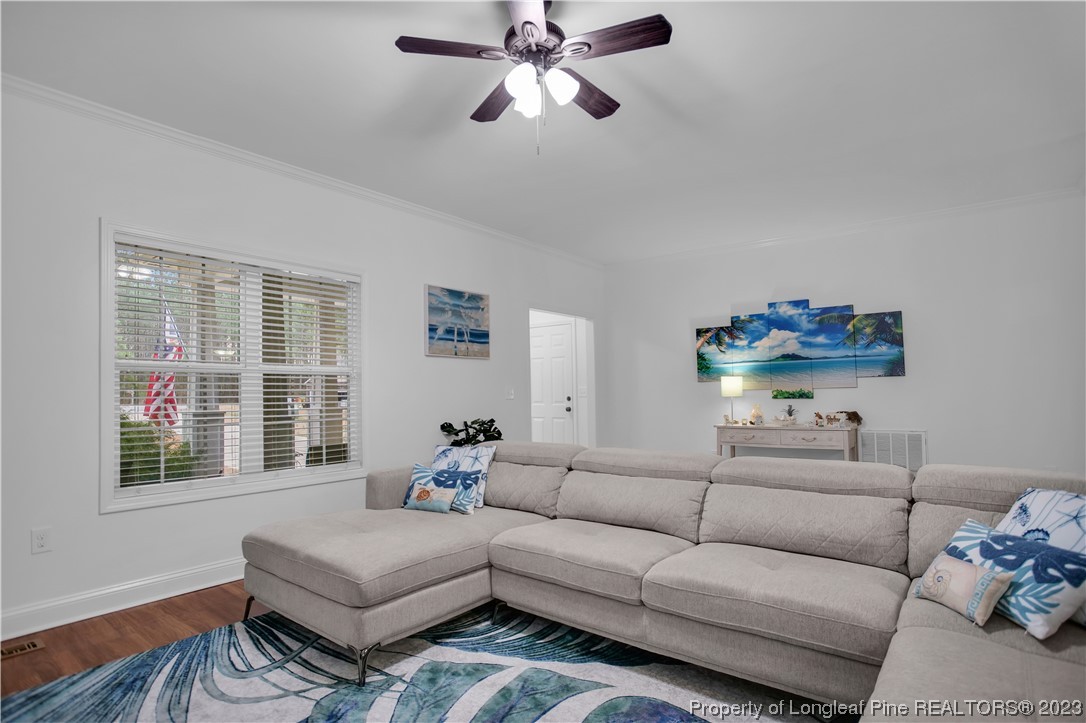 80 Valor Circle Bunnlevel, NC 28323 - Photo 12 of 49 a living room with furniture and a window