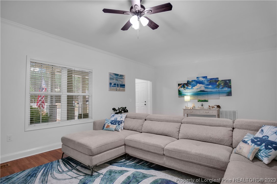 80 Valor Circle Bunnlevel, NC 28323 - Photo 14 of 49 a living room with furniture and a window