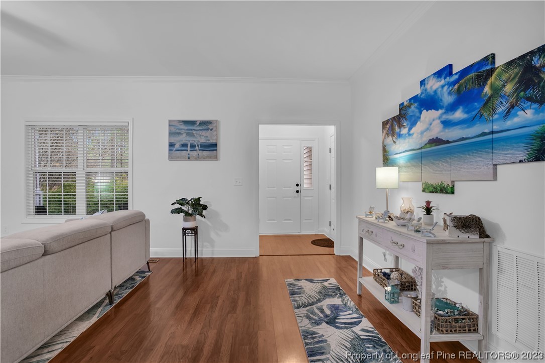 80 Valor Circle Bunnlevel, NC 28323 - Photo 20 of 49 a living room with furniture and wooden floor
