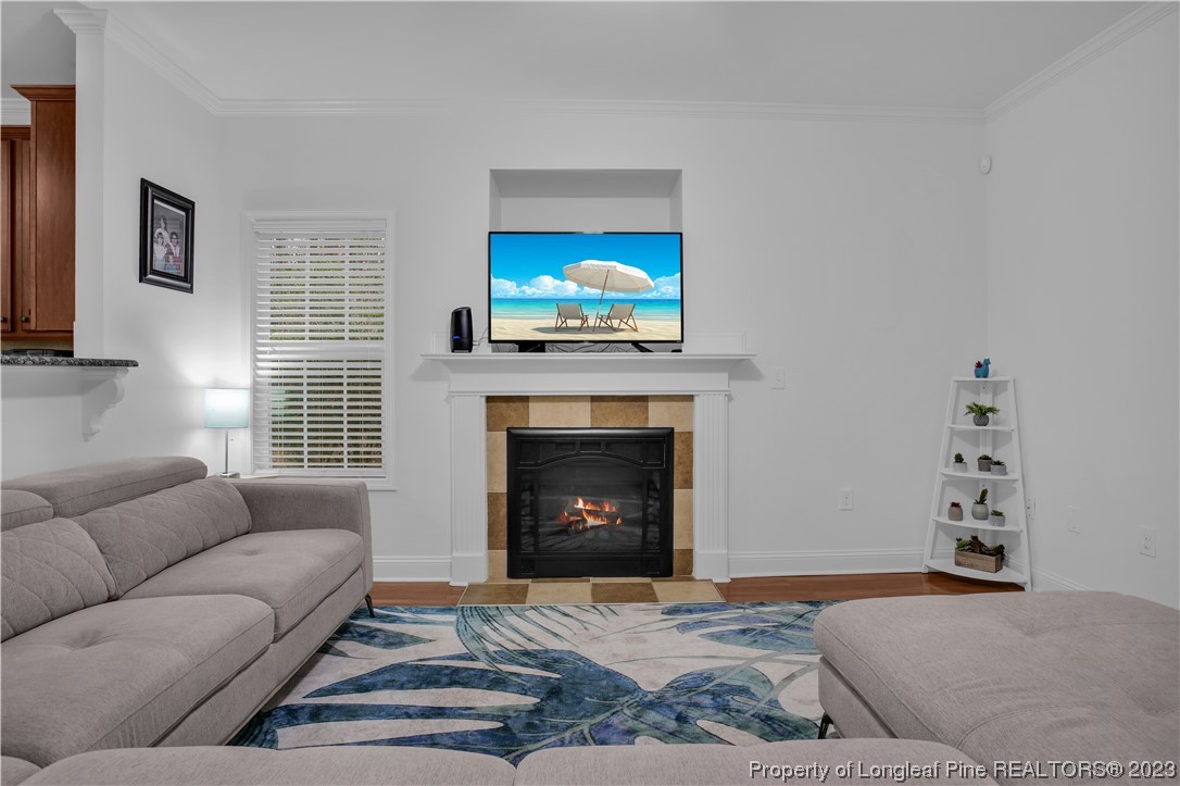 80 Valor Circle Bunnlevel, NC 28323 - Photo 21 of 49 a living room with furniture and a fireplace