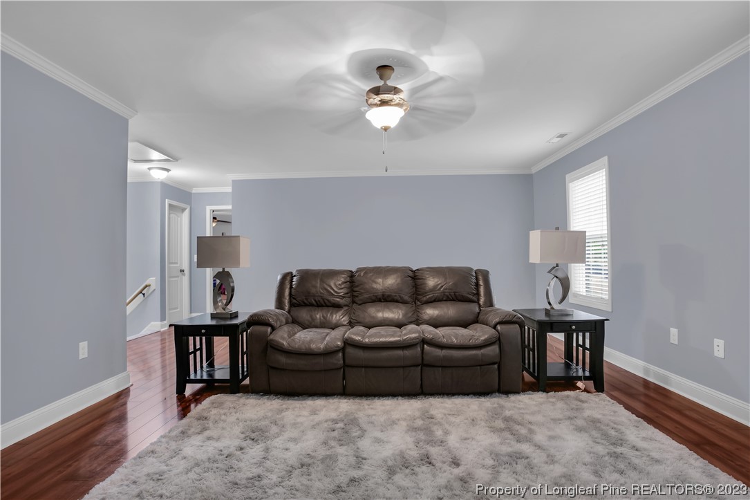 80 Valor Circle Bunnlevel, NC 28323 - Photo 31 of 49 a living room with furniture and white walls