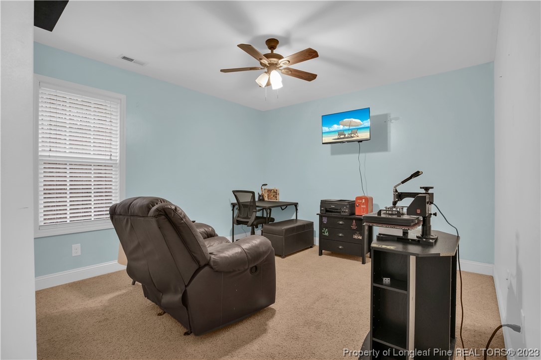 80 Valor Circle Bunnlevel, NC 28323 - Photo 34 of 49 a work room with furniture and a window